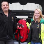Sarah Herbert and Phil Hanby hand-over the responder kit over as they change duty
