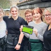 The team at Leonis, in Malton, celebrating with their five-out-of-five hygiene score