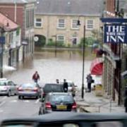 NO GO ZONE: The incessant rain left roads impassable and businesses flooded in Pickering.    Picture: Paul Hignett