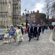 Actors entering York Minster for filming for The Crown Season 6