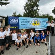 Pupils at St Joseph's Primary School in Pickering celebrate their Ofsted report