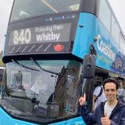 North Yorkshire Councillor George Jabbour, who represents the rural division of Helmsley and Sinnington, next to the 840 bus.