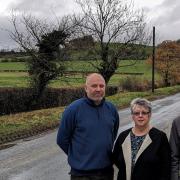 Councillors Steve Mason, Caroline Goodrick and George Jabbour who have joined forces to ask a broadband company that is planning to expand its operations within an Area of Outstanding Natural Beauty (AONB) to work with the community to preserve the local