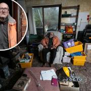 Hoarder Barry Tordoff, 76, sits in what was his front room in York. Picture: SWNS