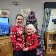 Residents and staff at Rivermead care home helped to make the world a better place by wearing a festival jumper on in aid of Save the Children's annual fundraising event, Christmas Jumper Day