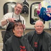 Phillip and Cynthia Fisher with their hairdresser, Caroline, and insert, their grandson, JJ.