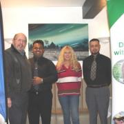 Rob Thomas, President of the Rotary Club; Alison Cashmore from Acorn Community, together with Asab and Abdul of Spice 4U