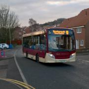 Caption: A bus in Hovingham Drive