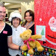 Major Alwyn Hockley, centre, with Jon Harrison and Lizzi Dobson, of Superdrug, at the gift appeal launch