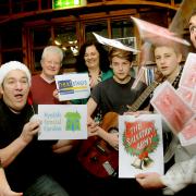 Magican Matt Woollons, left, promotes the variety show Yule Love It with, from left, DJ Mike Jefferson, Neil Suddaby, of Suddaby’s in Wheelgate, Malton, Di Keal, of Next Steps, Zac Woolley and George Ullyott, of folk duo The Wood Wars and show MC Ryan