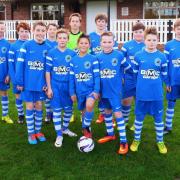 Old Malton St Mary's Under-12s in their new kit, sponsored by BMC Garage, Malton
