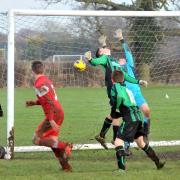 Kirkby-moorside U15s’ Alex Liley heads over the Woodthorpe keeper to score during the Minor League match at York College