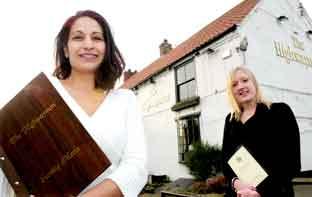 Ava Mollan, who is the new landlady of the Highwayman Inn, in Sheriff Hutton, pictured with colleague Laura Dews.