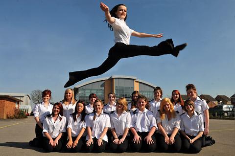 Sophie
Roger with
fellow dance
leaders during
the dance
festival at
Norton College.