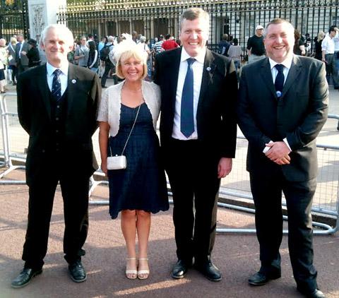 Roger Harley, chairman of Scarborough and Ryedale
Mountain Rescue Team (SRMRT), with Helen and Andrew Priestley and Andy Crossley
during their trip to the Queen’s
Garden Party at Buckingham Palace.