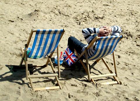Deck chairs on the beach at Scarborough by Barbara Hudson