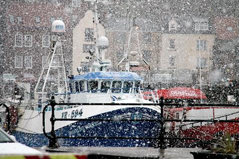 Blizzard conditions at Whitby harbour by Michael Barker