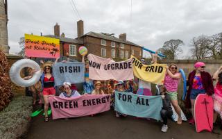 Greenpeace activists outside Rishi Sunak's home this morning in North Yorkshire