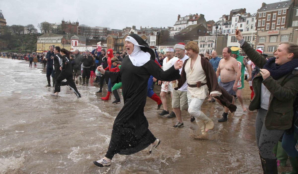 Revellers in fancy dress take part int he annual Scarborough New Year’s Day Dip. Picture: Richard Doughty