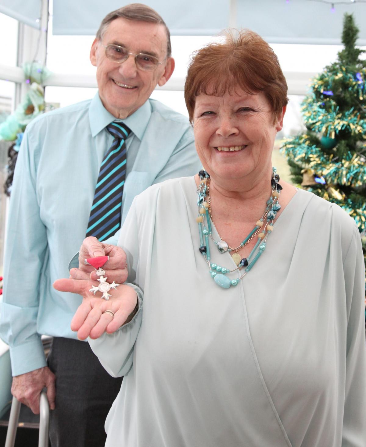 Janet Warin, of Pickering, celebrates receiving an MBE for her work in helping to educate young drivers. She is pictured with her husband, David.
Picture: Jo Hughes