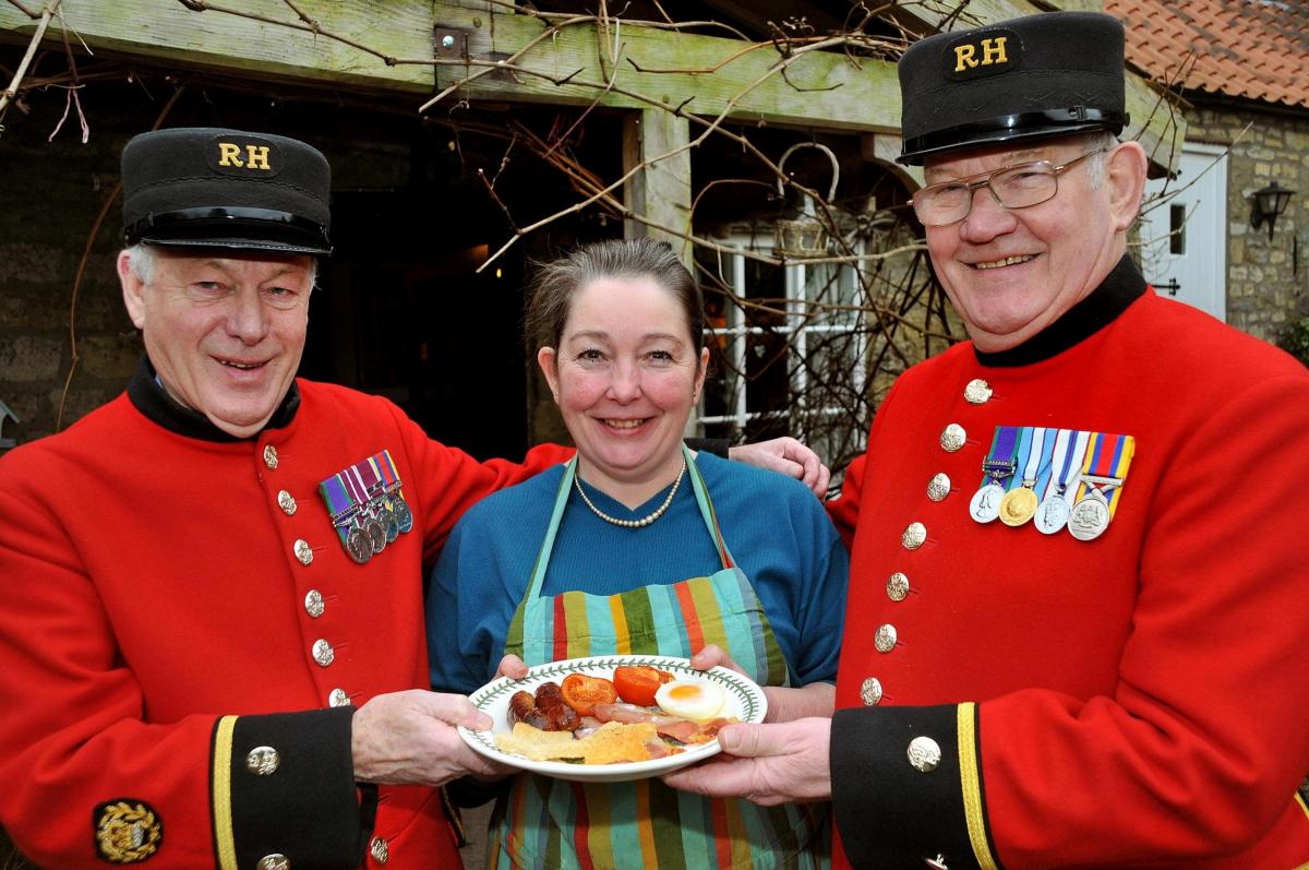 Ampleforth B&B owner Anna Lupton with Chelsea Pensioners Paddy Teegan, left, and Nick Clark, who were the special guests at Breakfast Week fundraising event.