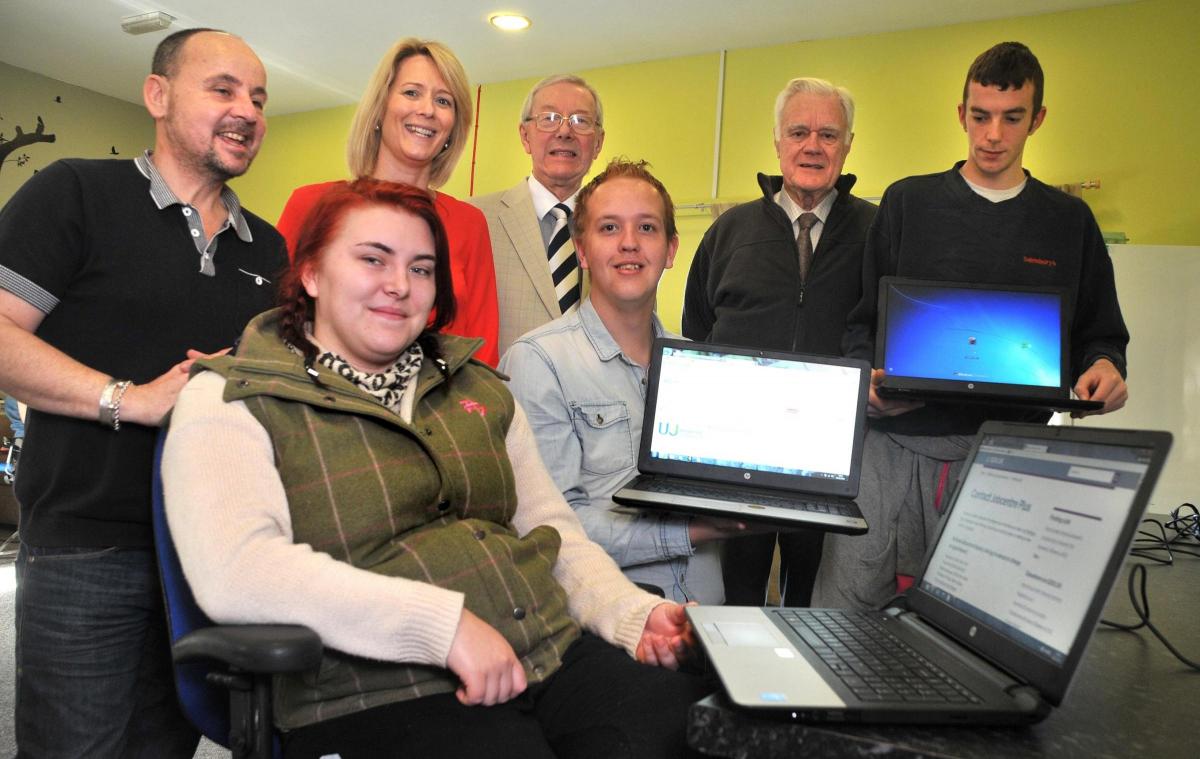 Ryedale YMCA receive three new laptops from Malton and Norton Rotary Club.Ffront left, Alana Ellis with Matt Marham, and back from left, Kevin Cooke, Karlie McGinty, David Wright, Colin Jennings and Matty Newall.     