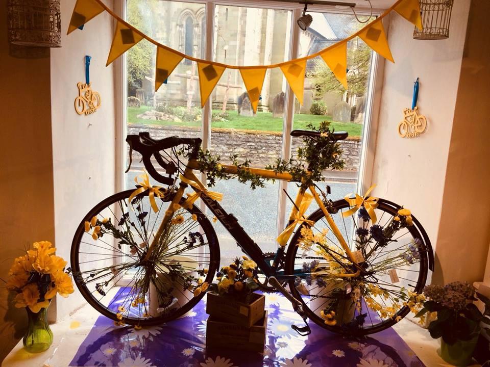 The Tour de Yorkshire decorated window at the Topiary Tree in Helmsley