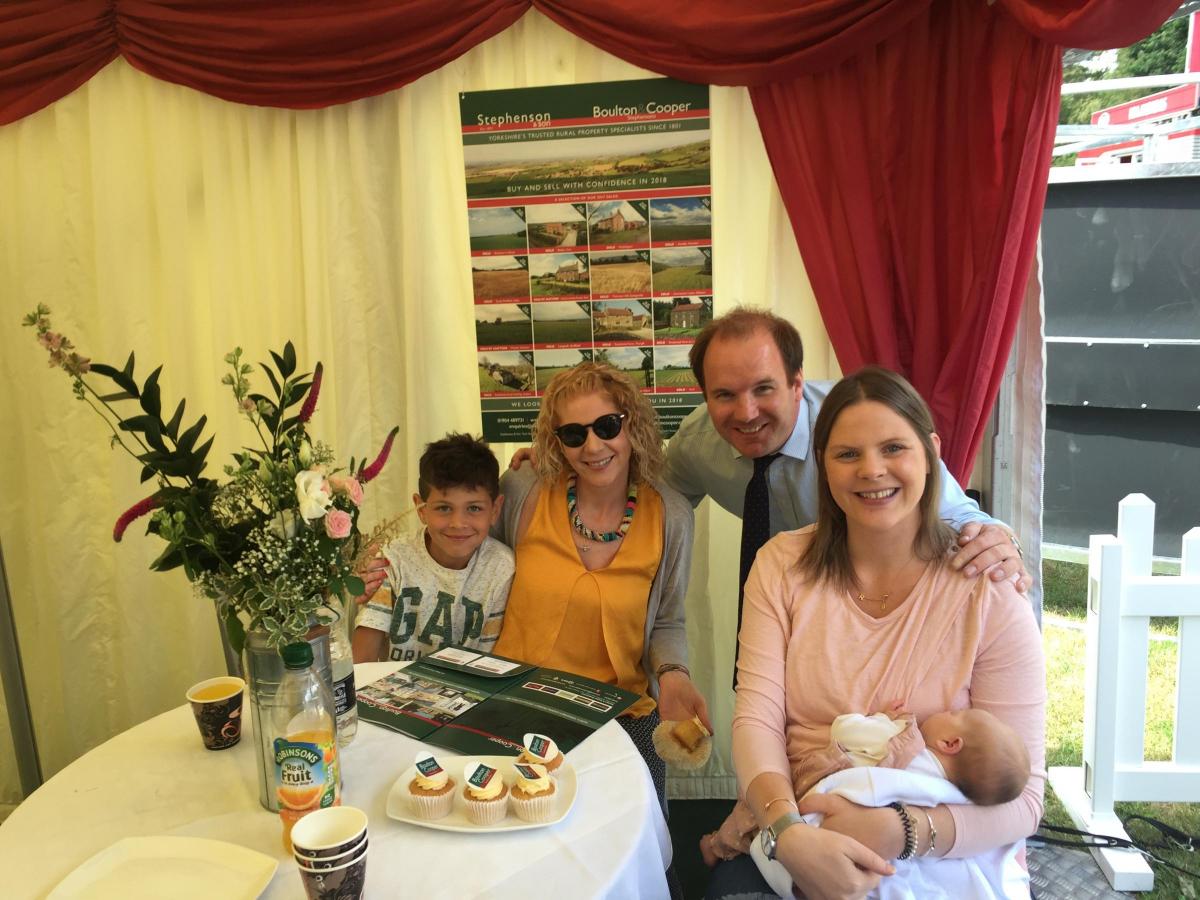 Henry Scott, Manager of Boulton & Cooper, Malton with his wife Rosie and his three week old daughter Beatrice all enjoying the Ryedale Show