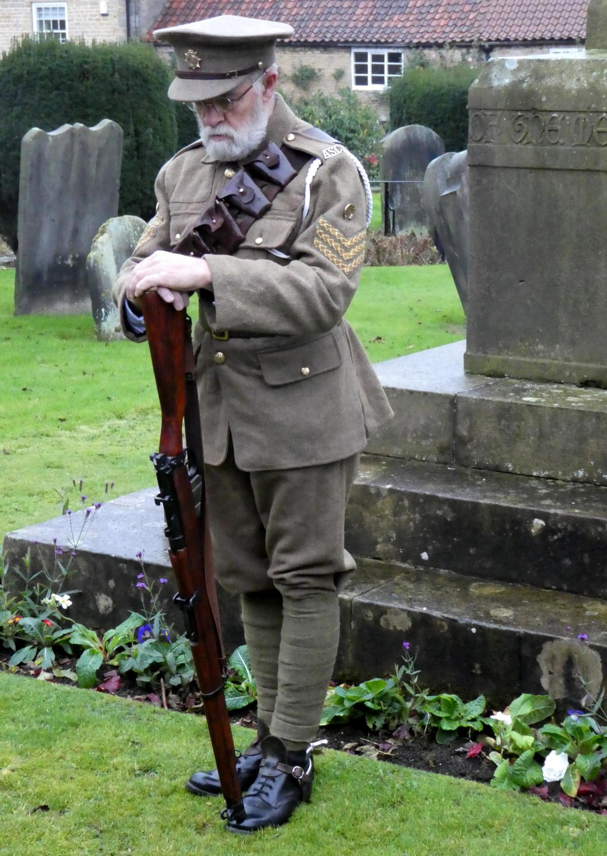 Jarvis Browning paying his respects at the Centenary Memorial Service at Kirkbymoorside. He is standing in front of the memorial cross in the church yard, where the Service of Remembrance took place.

Photo Gordon Clitheroe